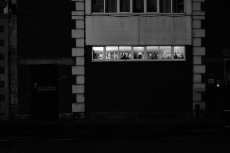 Liquor bottles seen through a window in Gloucester Road